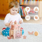 Cube_d_activite_Montessori_en_bois_Chateau_Magique_5_en_1_rose_pour_bebe_fille
