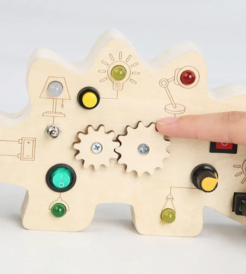 busy-board-interrupteur-dinosaure-sensoriel                                       