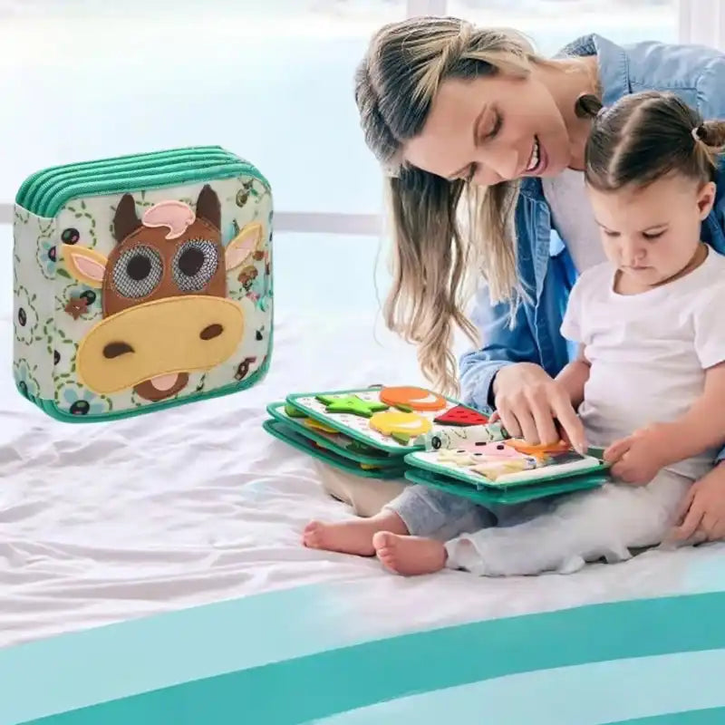 busy-board-livre-tissu-activite-bebe-fille